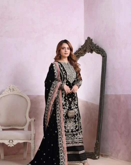Luxury premium velvet suit featuring fully heavy sequence & zari embroidery, chiffon embroidered dupatta, and silk trouser with patch detailing — perfect for formal & festive wear.