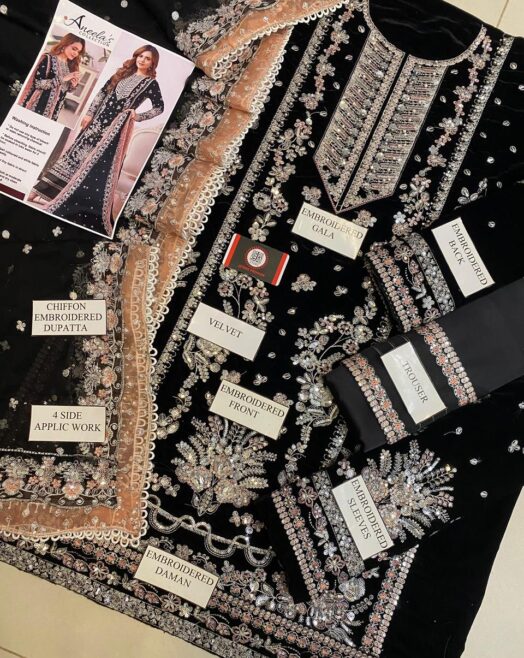 Luxury premium velvet suit featuring fully heavy sequence & zari embroidery, chiffon embroidered dupatta, and silk trouser with patch detailing — perfect for formal & festive wear.