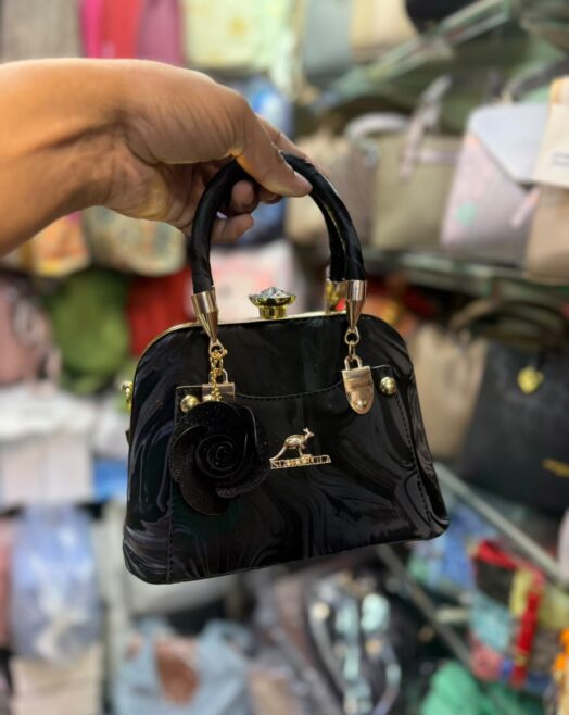 Luxury Marbled Faux Leather Handbag with Flower Charm Accent