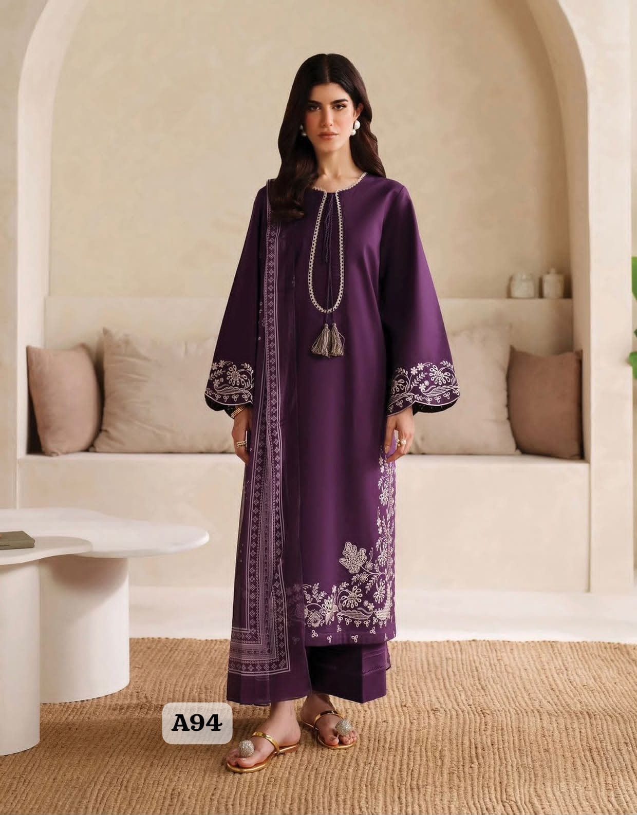 Product Details:Fabric Material: Premium Air-Jet Full Procedure Dhanak Design Code: A94 Shirt Details:Heavy Thread Embroidered Neckline Full Heavy Thread Embroidered Daman with Side Panel Embroidery Plain Back Heavy Thread Embroidered Sleeves (36 inches) Shawl / Dupatta: High-Quality Soft Printed Woolen Shawl Trouser: Coordinated Plain Trouser